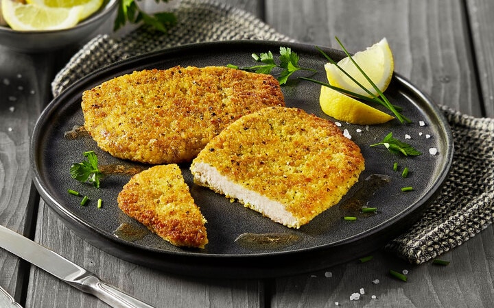 Escalopes de porc panées aux herbes et citron- avec 8% d‘assaisonnement liquide (Numéro d’article 10805)